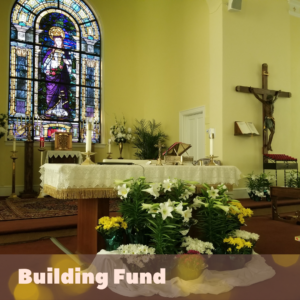 Image of the interior of a church with flowers sitting on the altar