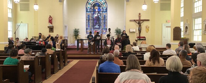 Teens standing on the altar in front of the church